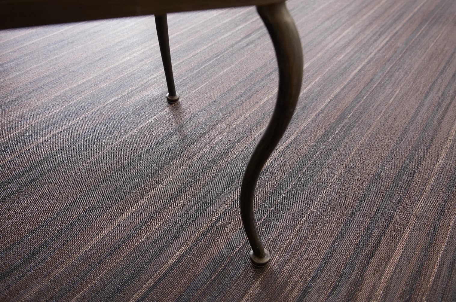ZAN woven vinyl wall-to-wall flooring running through an interior