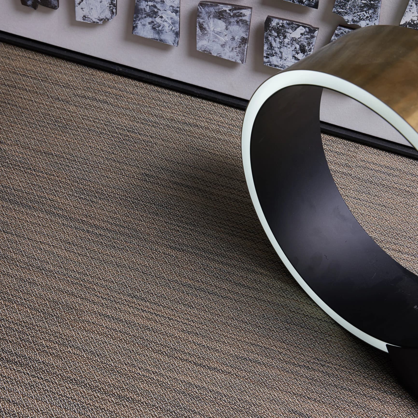 ZAN woven vinyl flooring beneath a sculptural form